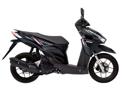 Темный скутер Honda Click, вид сбоку