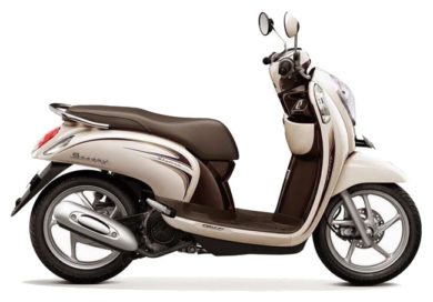 Кремово-коричневый ретро-скутер Honda Scoopy, вид сбоку